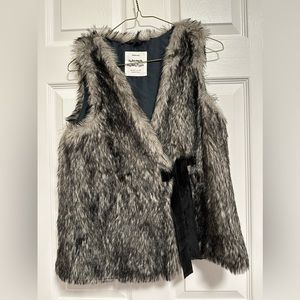 Only worn once - great faux fur vest. Children’s size 9/10